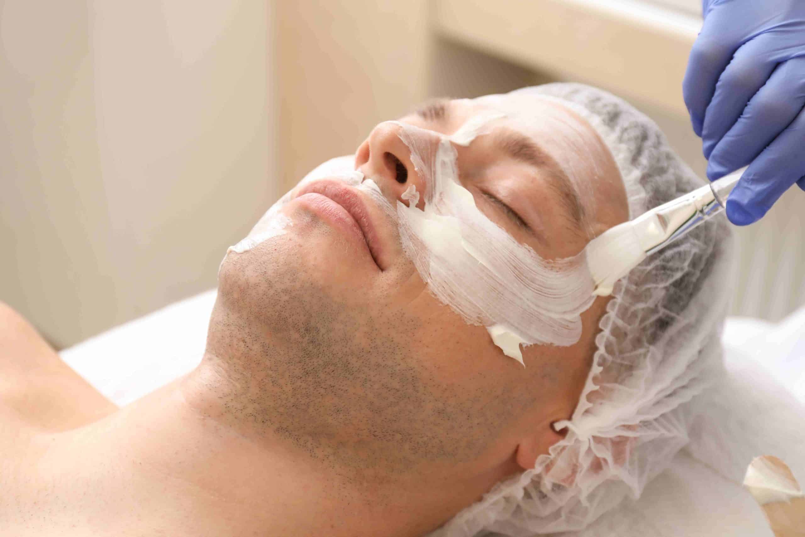 Man Getting Facial Aesthetic Treatment | Reclaim Men's Clinic in St. Louis, MO