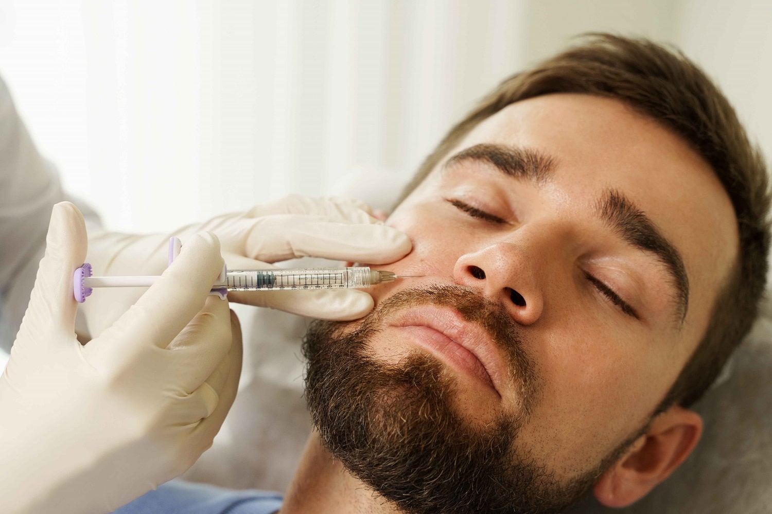 Man Getting Dermal Filler Treatment | Reclaim Men's Clinic in St. Louis, MO